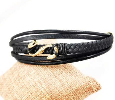 F&uuml;nf-Streifen-Armband aus schwarzem Leder und goldenem Edelstahl-Magnetverschluss.