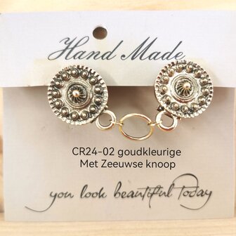 Clips,  Zeeuwse knoop met midden een ring in kleur antiek goud look.