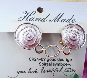 Clips, Spiralsymbol, ein Ring in Goldfarbe.