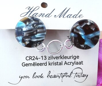 Clips, met Parelmoer gemêleerd Crystal Acrylaat en midden een ring in kleur goud. 