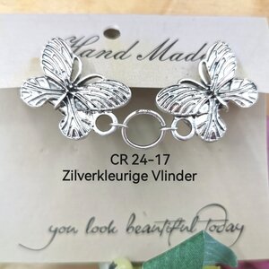 Clips, mit Schmetterling und einem Ring in der Mitte im AntikSilber-Look.