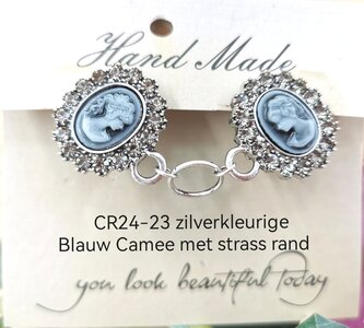 Clips, mit Blau - Kamee und Strasssteinen und einem Ring in der Mitte in Silber.