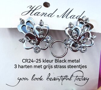 Clips, met 3 harten strass en midden een ring in kleur black metal look