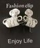 Clips, met puppy hondje en midden een ring in kleur antiek zilver look. _