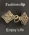 Clips, met Keltische klaver cirkel symbool en midden een ring in kleur antiek goud look. _